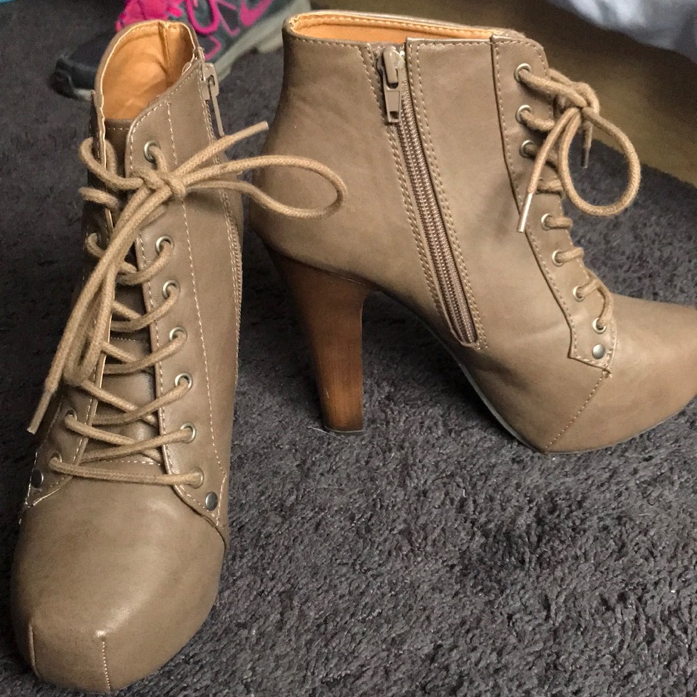 High heeled laced up booties